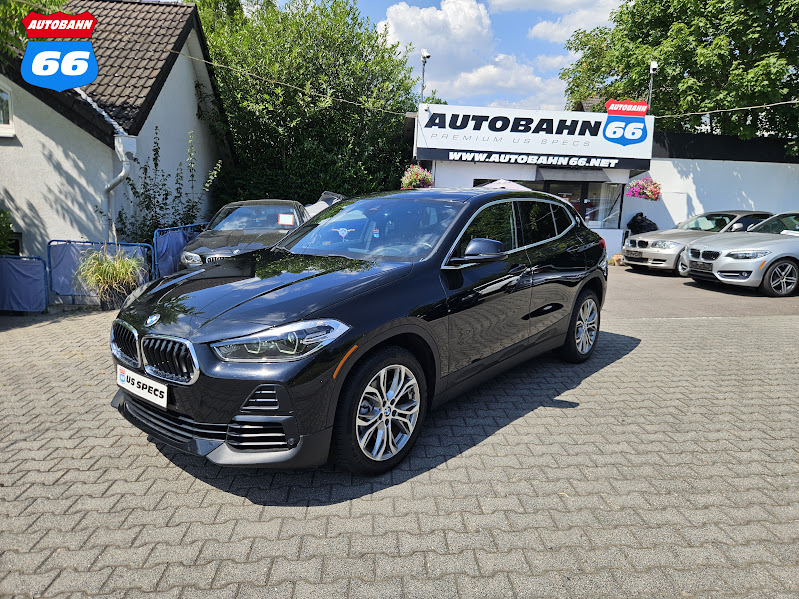 2022 BMW X2 sDrive28i in Jet Black, front three-quarter view on the Autobahn66 lot, US-spec and tax-free