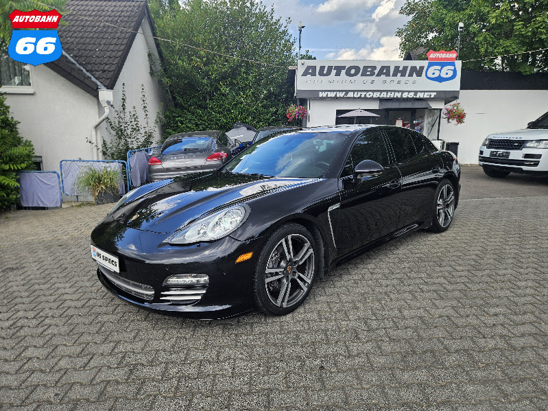 2013 Porsche Panamera Platinum Edition Basalt Black front three-quarter, US-spec tax-free at Autobahn66 Wiesbaden
