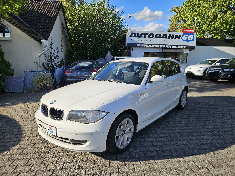 2009 BMW 116i in front of Autobahn66 car sales