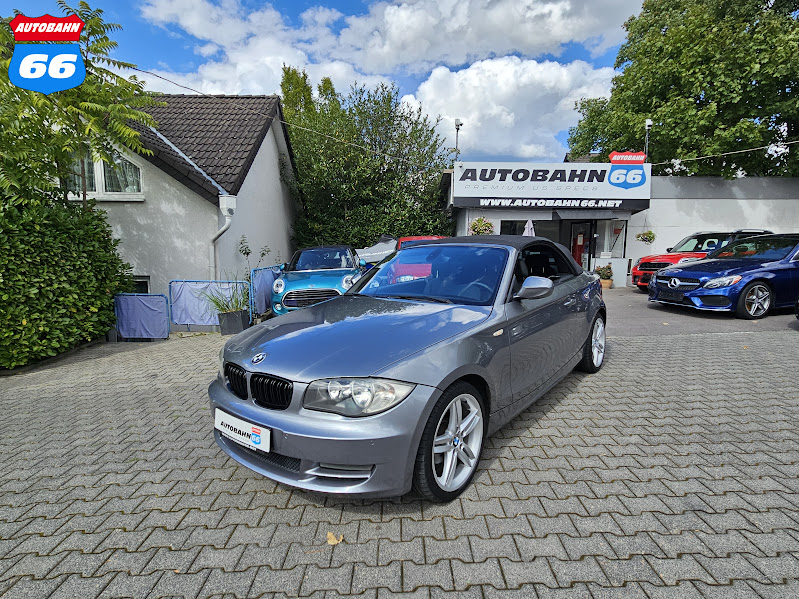 2011 BMW 118d convertible in front of Autobahn66 car sales
